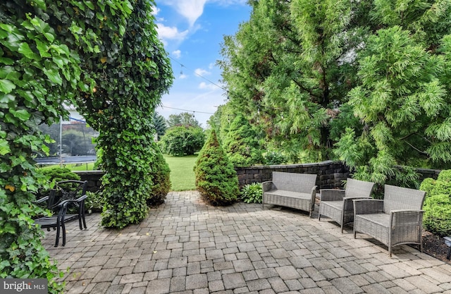 105 Quarry View Dr, Morgantown, PA 19543 - view of patio featuring a trampoline and an outdoor living space