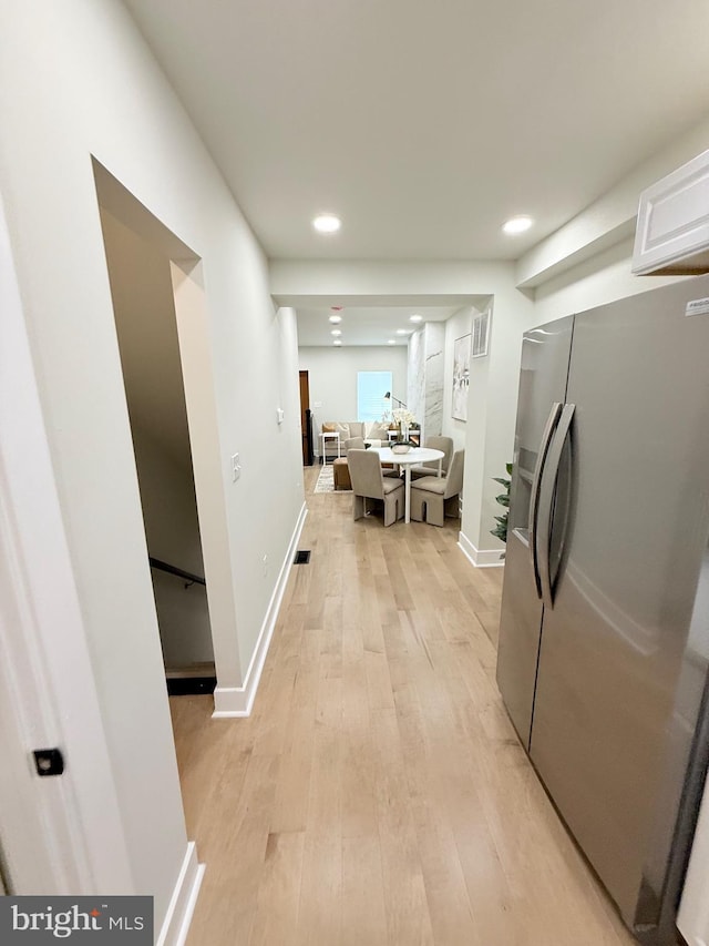 2112 Llewelyn Ave, Baltimore, MD 21213 - hall featuring light wood-style floors, recessed lighting, and baseboards