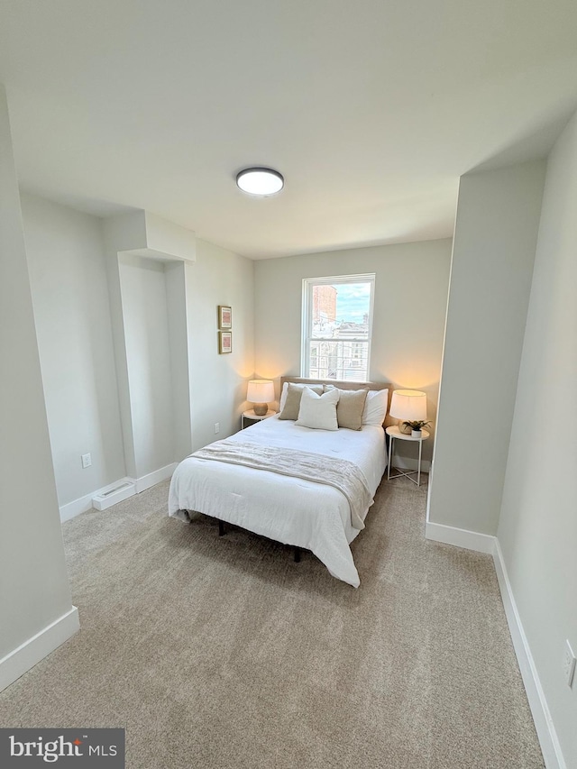 2112 Llewelyn Ave, Baltimore, MD 21213 - bedroom featuring carpet and baseboards