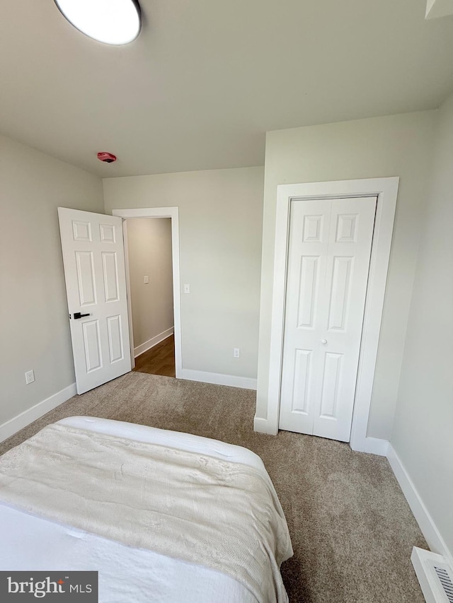 2112 Llewelyn Ave, Baltimore, MD 21213 - carpeted bedroom with baseboards