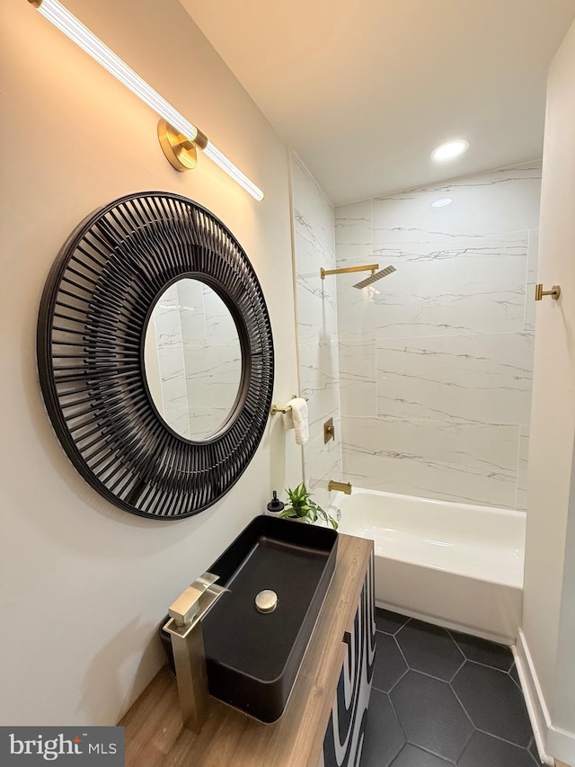 2112 Llewelyn Ave, Baltimore, MD 21213 - bathroom with tile patterned flooring, bathtub / shower combination, recessed lighting, and baseboards