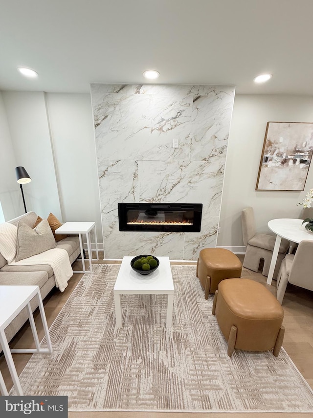 2112 Llewelyn Ave, Baltimore, MD 21213 - living area featuring a high end fireplace, recessed lighting, and baseboards