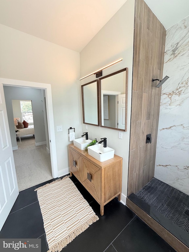 2112 Llewelyn Ave, Baltimore, MD 21213 - bathroom featuring tiled shower and double vanity