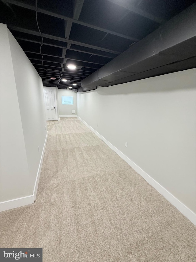 2112 Llewelyn Ave, Baltimore, MD 21213 - basement featuring carpet flooring and baseboards