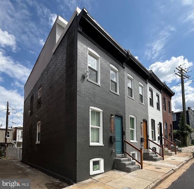 2112 Llewelyn Ave, Baltimore, MD 21213 - view of front of home featuring brick siding