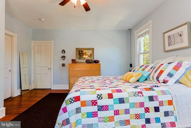 922 8th Ave, Prospect Park, PA 19076 - bedroom with wood finished floors, a ceiling fan, and baseboards