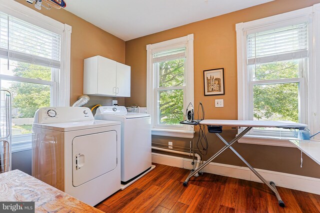 922 8th Ave, Prospect Park, PA 19076 - laundry area featuring cabinet space, washer and dryer, and wood finished floors