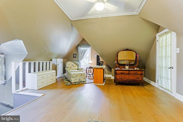 922 8th Ave, Prospect Park, PA 19076 - living area featuring wood finished floors, a ceiling fan, ornamental molding, and vaulted ceiling