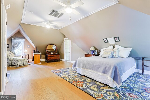 922 8th Ave, Prospect Park, PA 19076 - bedroom with light wood-type flooring, vaulted ceiling, baseboards, and a ceiling fan