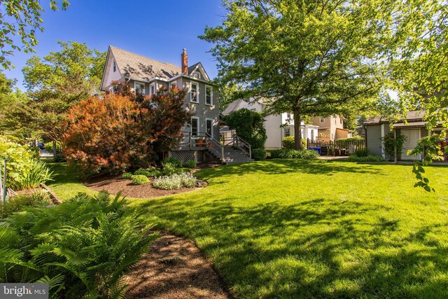 922 8th Ave, Prospect Park, PA 19076 - view of grassy yard with stairway and a wooden deck