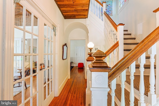 922 8th Ave, Prospect Park, PA 19076 - entrance foyer featuring wood-type flooring, stairs, french doors, baseboards, and wooden ceiling