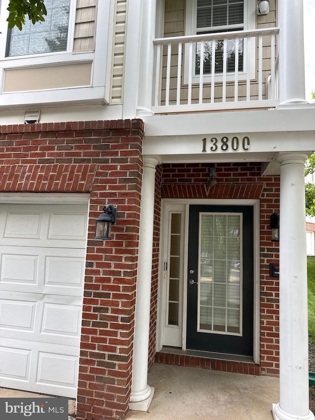 13800 Breezy Ridge Way Unit 101, Woodbridge, VA 22191 - property entrance featuring brick siding
