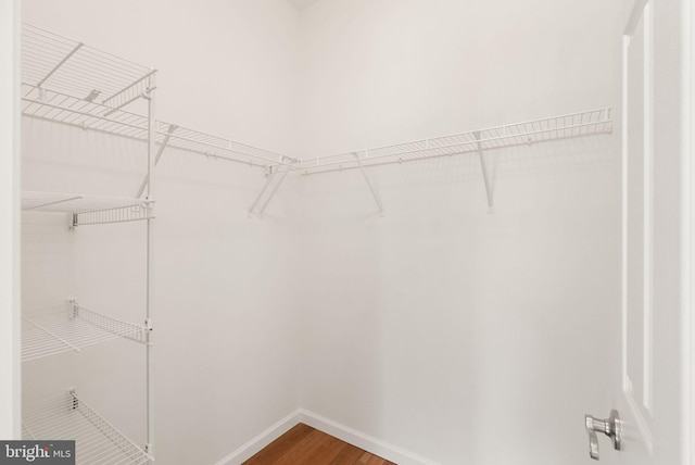 13800 Breezy Ridge Way Unit 101, Woodbridge, VA 22191 - spacious closet featuring wood finished floors