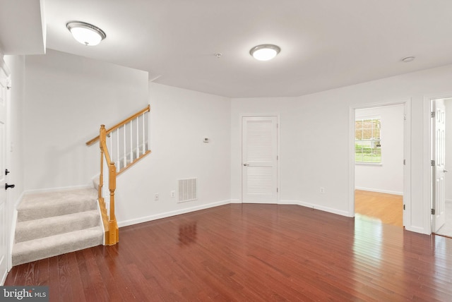 13800 Breezy Ridge Way Unit 101, Woodbridge, VA 22191 - unfurnished living room with wood finished floors, stairs, and baseboards