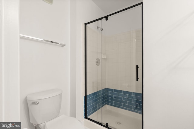13800 Breezy Ridge Way Unit 101, Woodbridge, VA 22191 - bathroom featuring a stall shower and toilet