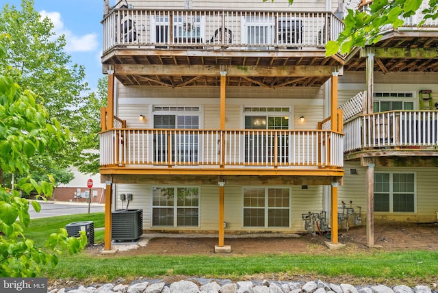 13800 Breezy Ridge Way Unit 101, Woodbridge, VA 22191 - rear view of house featuring central AC unit and a deck