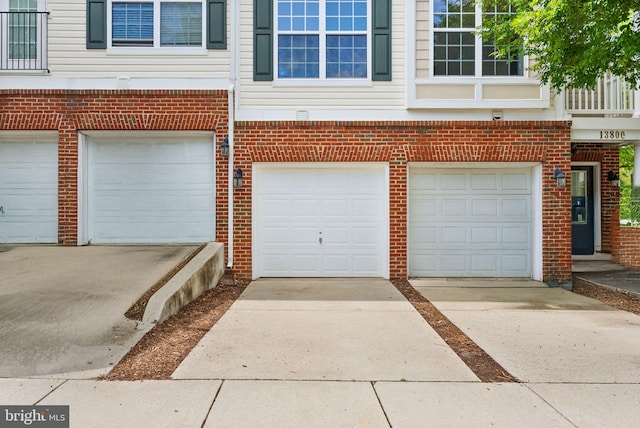 13800 Breezy Ridge Way Unit 101, Woodbridge, VA 22191 - garage featuring driveway