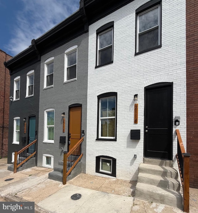 2114 Llewelyn Ave, Baltimore, MD 21213 - townhome / multi-family property featuring entry steps and brick siding