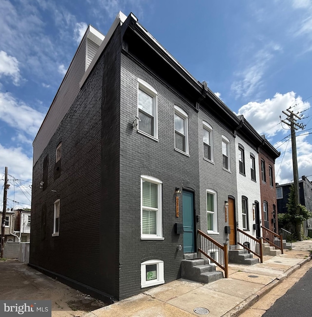 2114 Llewelyn Ave, Baltimore, MD 21213 - townhome / multi-family property featuring brick siding