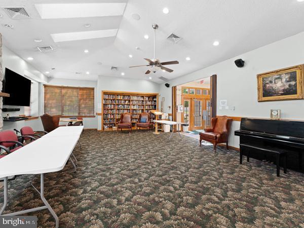 902 Scotswood Ct, Mount Laurel, NJ 08054 - living area with carpet flooring, vaulted ceiling, recessed lighting, and ceiling fan