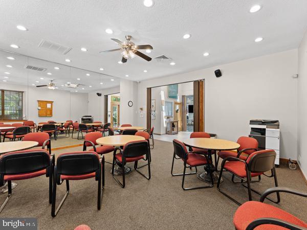 902 Scotswood Ct, Mount Laurel, NJ 08054 - dining room featuring ceiling fan, healthy amount of natural light, recessed lighting, and light colored carpet