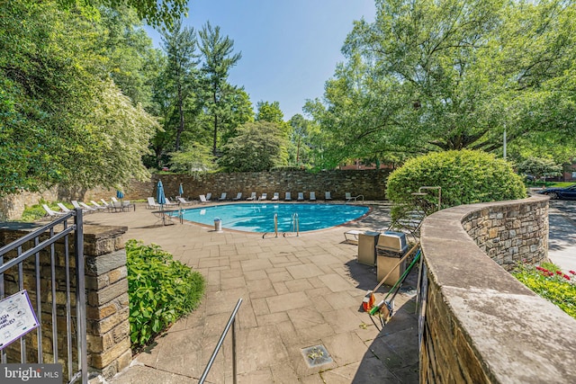 4000 Tunlaw Rd NW Unit 602, Washington, DC 20007 - community pool featuring a patio area