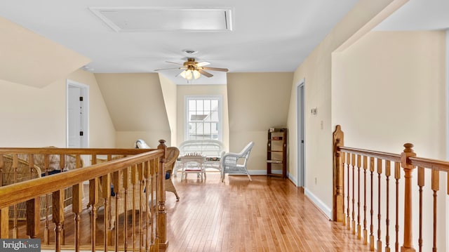 1702 Ferry Point Ct, Trappe, MD 21673 - hall featuring an upstairs landing, light wood-style flooring, and baseboards