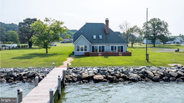 1702 Ferry Point Ct, Trappe, MD 21673 - back of house with a lawn, a water view, and a chimney