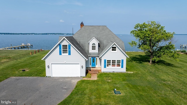 1702 Ferry Point Ct, Trappe, MD 21673 - traditional-style home with a water view, driveway, and a front lawn
