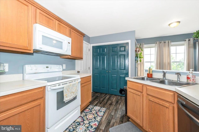 186 Brush Dr, Martinsburg, WV 25405 - kitchen featuring white appliances, a sink, dark wood-style floors, and light countertops