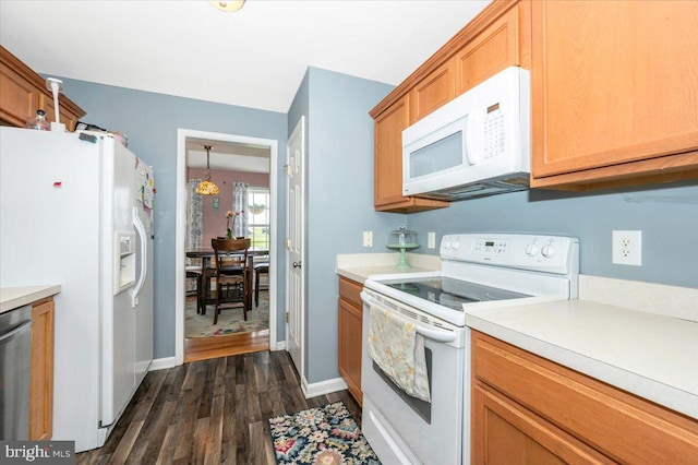 186 Brush Dr, Martinsburg, WV 25405 - kitchen with white appliances, dark wood-style floors, light countertops, and baseboards