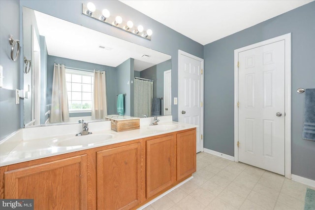 186 Brush Dr, Martinsburg, WV 25405 - full bathroom with double vanity and baseboards