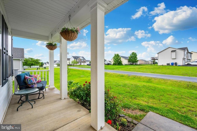186 Brush Dr, Martinsburg, WV 25405 - wooden porch featuring a residential view and a yard