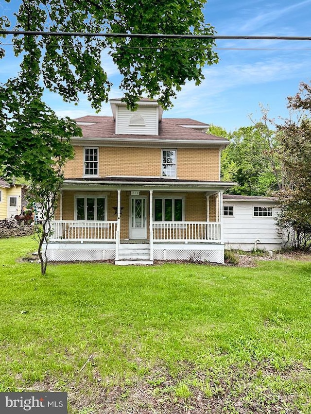 873 Maple St, Lanse, PA 16849 - view of front of home with a porch and a front lawn