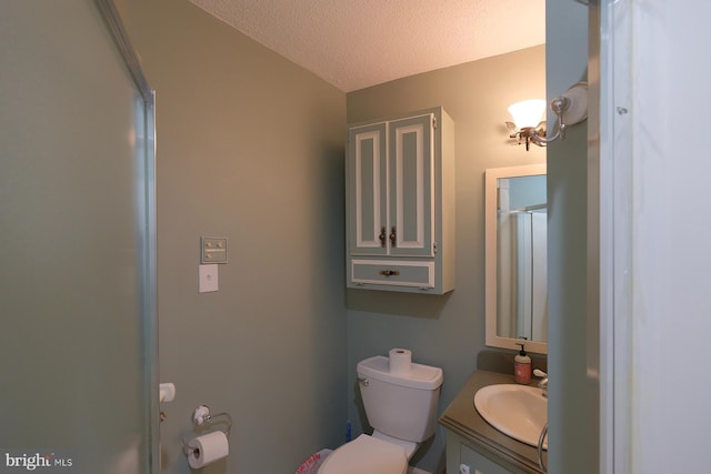4027 Trego Mountain Rd, Keedysville, MD 21756 - bathroom with vanity, toilet, and a textured ceiling