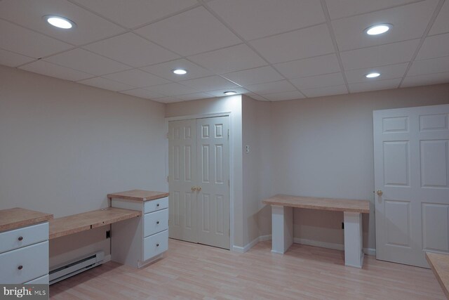 4027 Trego Mountain Rd, Keedysville, MD 21756 - unfurnished office featuring baseboard heating, light wood-style floors, recessed lighting, baseboards, and a paneled ceiling
