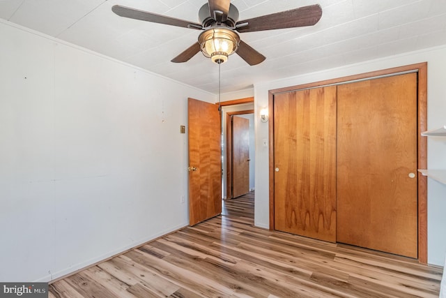 230 N Harrison St, Palmyra, PA 17078 - unfurnished bedroom featuring light wood-type flooring, a closet, and ceiling fan