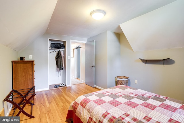 5518 Kempton Dr, Springfield, VA 22151 - bedroom with lofted ceiling, light wood-type flooring, and baseboards