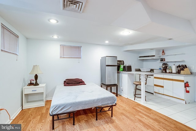 5518 Kempton Dr, Springfield, VA 22151 - bedroom featuring light wood-style flooring, recessed lighting, baseboards, and freestanding refrigerator