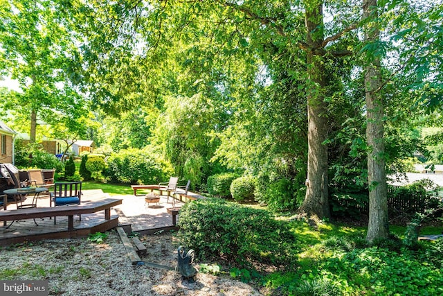 5518 Kempton Dr, Springfield, VA 22151 - view of yard featuring an outdoor fire pit and a patio