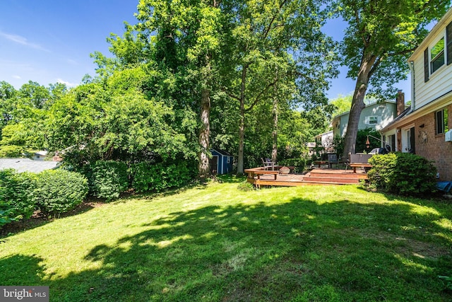 5518 Kempton Dr, Springfield, VA 22151 - view of grassy yard with a wooden deck