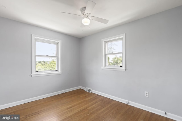 4022 Evans Ln, Drexel Hill, PA 19026 - unfurnished room featuring baseboards, wood finished floors, and a ceiling fan
