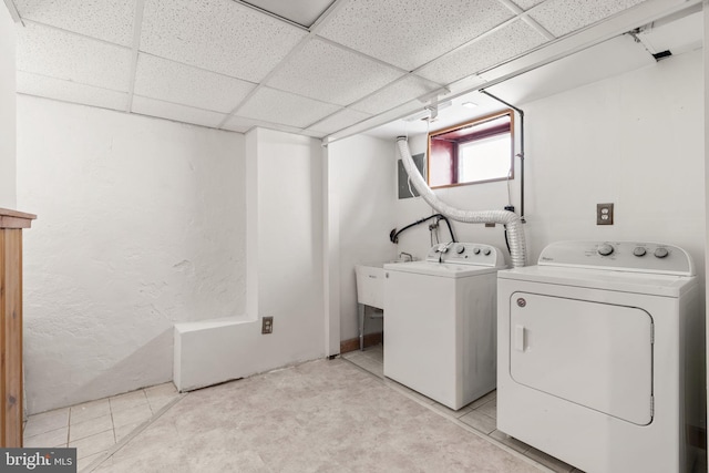 4022 Evans Ln, Drexel Hill, PA 19026 - laundry area featuring washer and dryer and light tile patterned flooring
