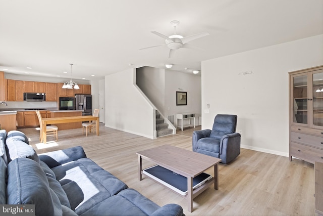 30 Ivy Spring Ln, Fredericksburg, VA 22406 - living room featuring stairs, light wood-style flooring, recessed lighting, baseboards, and a ceiling fan