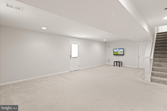 30 Ivy Spring Ln, Fredericksburg, VA 22406 - below grade area with stairway, light carpet, baseboards, and recessed lighting