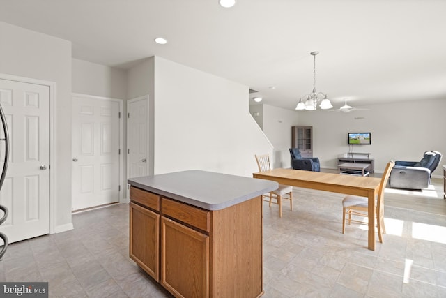 30 Ivy Spring Ln, Fredericksburg, VA 22406 - kitchen featuring a chandelier, a center island, decorative light fixtures, open floor plan, and recessed lighting
