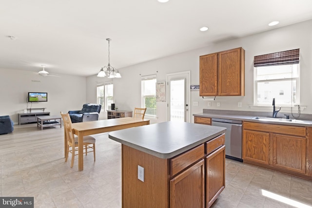 30 Ivy Spring Ln, Fredericksburg, VA 22406 - kitchen featuring dishwasher, a center island, open floor plan, brown cabinetry, and a sink