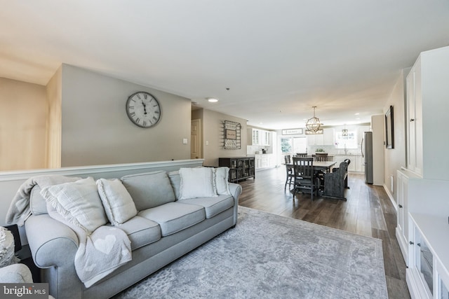 515 Williamsburg Way, King Of Prussia, PA 19406 - living area with dark wood finished floors, a chandelier, and recessed lighting