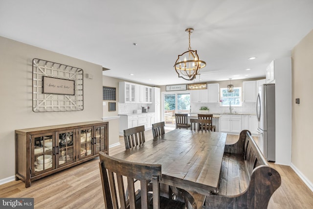 515 Williamsburg Way, King Of Prussia, PA 19406 - dining area featuring a chandelier, light wood-type flooring, recessed lighting, and baseboards