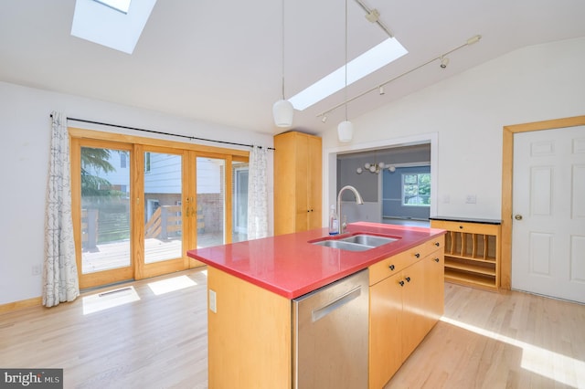 1104 Milroy Ct, Winchester, VA 22601 - kitchen with dishwasher, lofted ceiling, light wood finished floors, track lighting, and a skylight